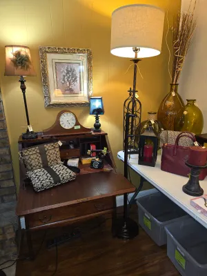 Beautiful antique secretary
To the right is a cool adjustable floor lamp