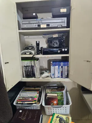 XBox 360 and games, PS4 games, DVD player, Clock radio CD player