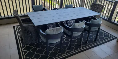 RESTORATION HARDWARE OUTDOOR METAL TABLE AND CHAIRS WITH TWO ARHAUS END CHAIRS