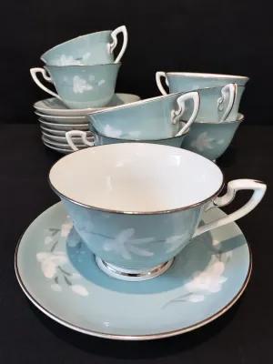 "MOONFLOWER" TEA CUPS AND SAUCERS BY ROYAL WORCESTER 