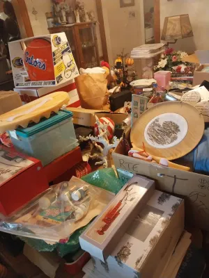 Assorted household goods and collectibles, including a Florida Gators helmet snack bowl in its original box, a decorative wooden plate,...