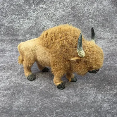 Vintage fur-covered bison figurine with realistic horns and hooves, showing light wear.