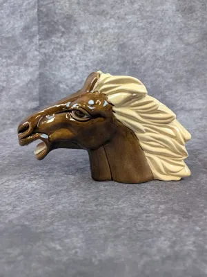 Vintage glazed ceramic horse head bust featuring a brown coat and flowing cream-colored mane in mid-century style.