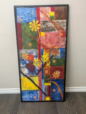 Large vertical abstract mixed media painting on canvas, featuring a colorful geometric patchwork design overlaid with floral motifs and...