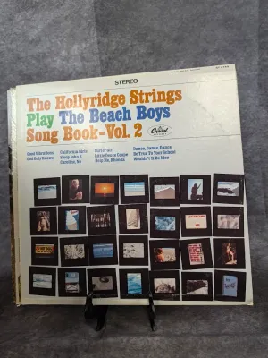 Vintage 1967 vinyl album cover for 'The Hollyridge Strings Play The Beach Boys Song Book-Vol. 2' released by Capitol Records.