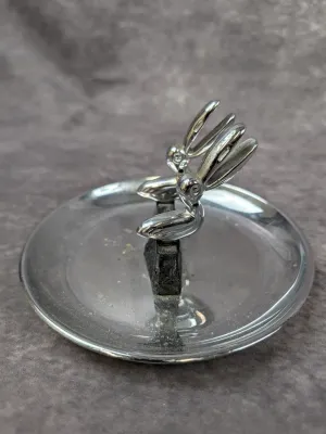 Vintage chrome-plated ring dish featuring two stylized pelican figures at the center, showing minor wear and tarnish.