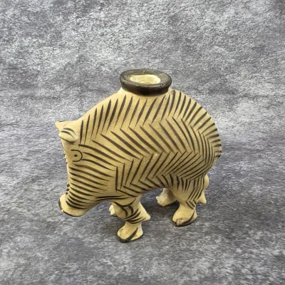 Hand-painted ceramic wild boar vessel featuring a textured herringbone pattern in black on a tan background, likely of Mexican or South...