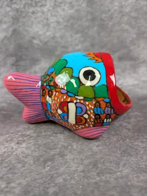 Hand-painted Mexican folk art ceramic fish figure with an open mouth, featuring vibrant polychrome patterns and a glossy finish.