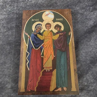 Greek Orthodox Holy Family wooden icon plaque, depicting Mary, Joseph, and the child Jesus with Greek lettering.