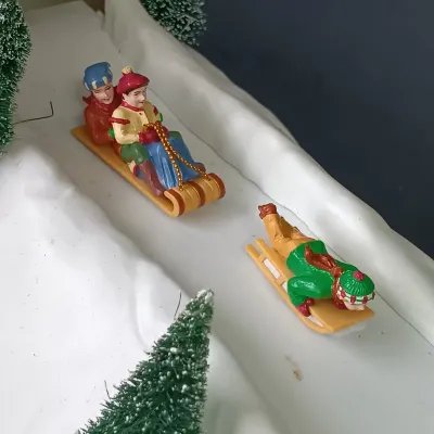LOT 177: Department 56 Village Animated Hill and North Pole Series Downhill Elves
