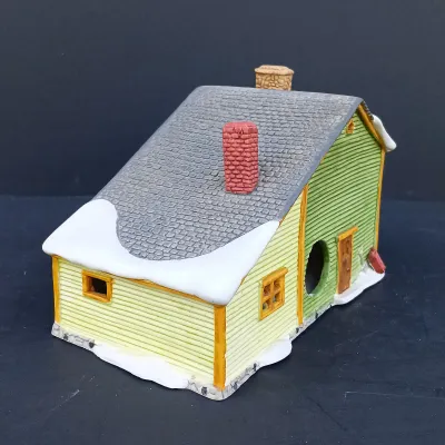 LOT 128: Department 56 Dickens Village Series The Old Curiosity Shop and Geo Weeton Watchmaker with New England Village Series Nathaniel...