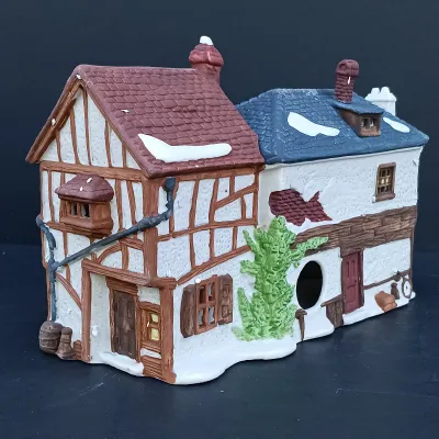 LOT 128: Department 56 Dickens Village Series The Old Curiosity Shop and Geo Weeton Watchmaker with New England Village Series Nathaniel...