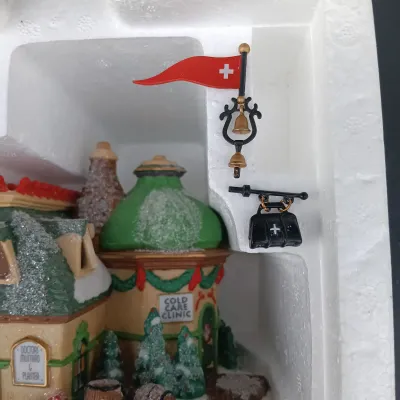 LOT 167: Department 56 North Pole Series Mini-Donut Shop and Cold Care Clinic