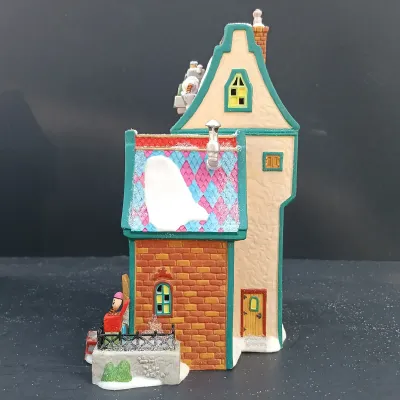 LOT 164: Department 56 North Pole Series Marie's Doll Museum and Jack In The Box Plant No. 2