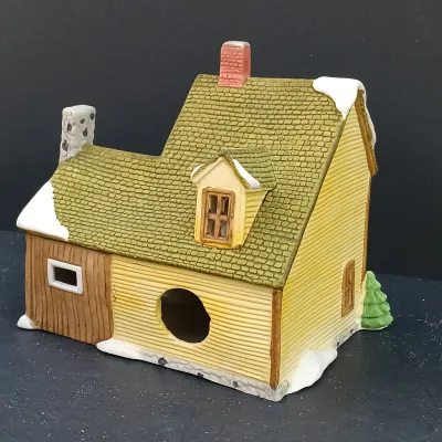 LOT 135: Department 56 New England Village Series Yankee Jud Bell Casting, Livery Stable & Boot Shop and Ben's Barber Shop