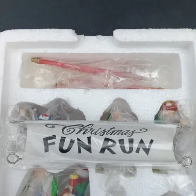 LOT 166: Department 56 North Pole Series Ginny's Cookie Treats Set, Christmas Fun Run and Have a Seat Elves