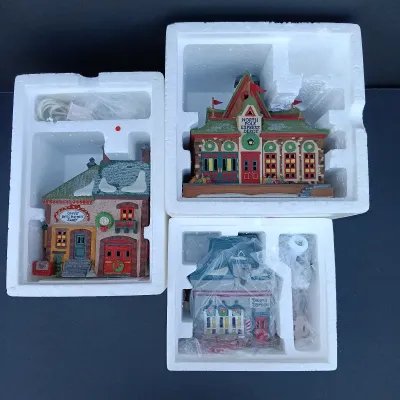 LOT 123: Department 56 North Pole Series Orly's Bell & Harness Supply, North Pole Express Depot and Beard Barber Shop