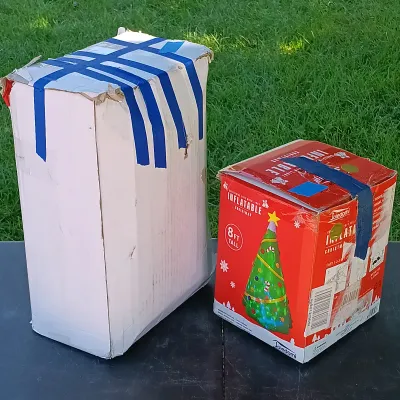 LOT 118: Inflatable 8ft Christmas Tree with Inflatable Christmas Castle