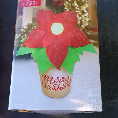 LOT 120: Pair of 4ft Inflatable Christmas Poinsettas with (5) 3-Packs of Snowflake Twinkling Stakes