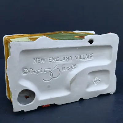 LOT 128: Department 56 Dickens Village Series The Old Curiosity Shop and Geo Weeton Watchmaker with New England Village Series Nathaniel...