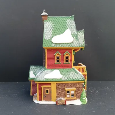 LOT 134: Department 56 North Pole Series Santa's Rooming House, Neenee's Dolls & Toys, and End of the Line