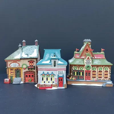 LOT 123: Department 56 North Pole Series Orly's Bell & Harness Supply, North Pole Express Depot and Beard Barber Shop