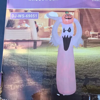 LOT 113: Inflatable 8ft Halloween Town Tree with Inflatable 6ft Ghost