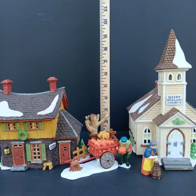 LOT 127: Department 56 New England Series Sleepy Hollow Ichabod Crane's Cottage, Sleepy Hollow Church and Harvest Time
