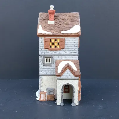 LOT 124: Department 56 Dickens' Village Series Nicholas Nickleby Cottage, Peggoty's Seaside Cottage and Poulterer