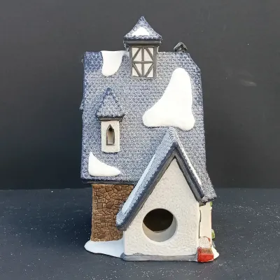 LOT 134: Department 56 North Pole Series Santa's Rooming House, Neenee's Dolls & Toys, and End of the Line