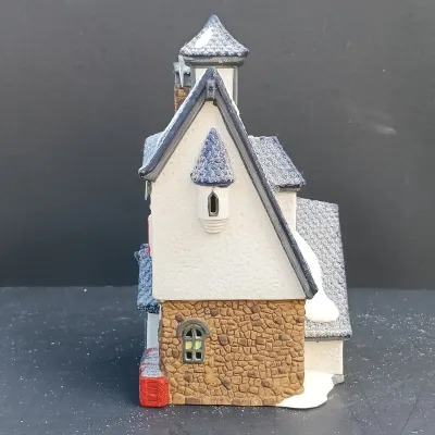 LOT 134: Department 56 North Pole Series Santa's Rooming House, Neenee's Dolls & Toys, and End of the Line