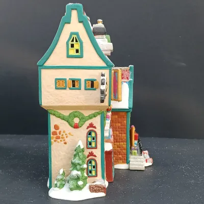 LOT 164: Department 56 North Pole Series Marie's Doll Museum and Jack In The Box Plant No. 2
