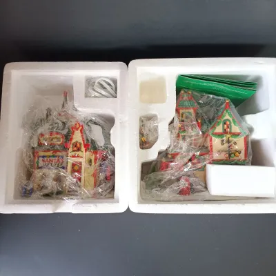 LOT 173: Department 56 North Pole Series Glass Ornament Works and Santa's Light Shop