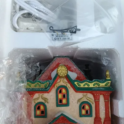 LOT 164: Department 56 North Pole Series Marie's Doll Museum and Jack In The Box Plant No. 2