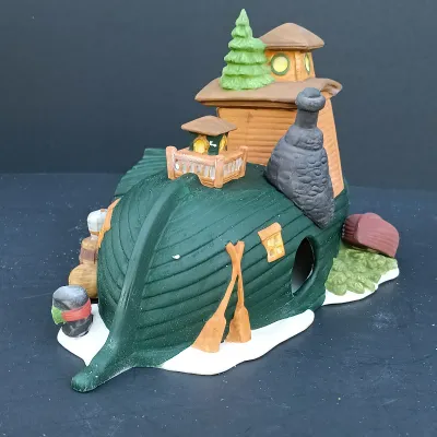 LOT 124: Department 56 Dickens' Village Series Nicholas Nickleby Cottage, Peggoty's Seaside Cottage and Poulterer