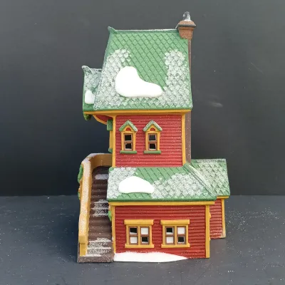 LOT 134: Department 56 North Pole Series Santa's Rooming House, Neenee's Dolls & Toys, and End of the Line