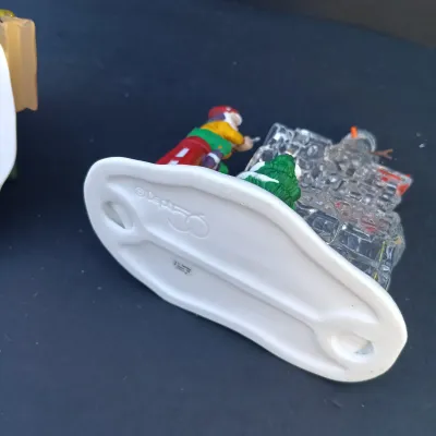 LOT 131: Department 56 Peppermint Skating Party, Untangle the Christmas Lights, A Busy Elf and Elf Bunkhouse