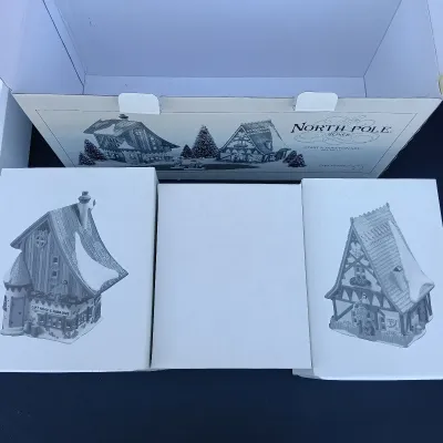 LOT 125: Department 56 North Pole Series Start a Tradition Set with Pencil Pines