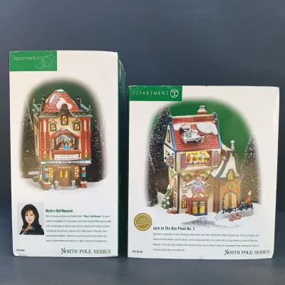 LOT 164: Department 56 North Pole Series Marie's Doll Museum and Jack In The Box Plant No. 2