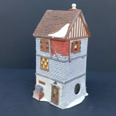 LOT 124: Department 56 Dickens' Village Series Nicholas Nickleby Cottage, Peggoty's Seaside Cottage and Poulterer