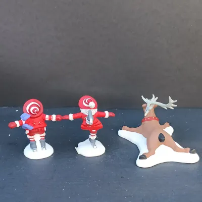 LOT 131: Department 56 Peppermint Skating Party, Untangle the Christmas Lights, A Busy Elf and Elf Bunkhouse
