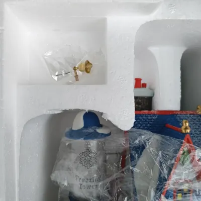 LOT 168: Department 56 North Pole Series Real Plastic Snow Factory and Tillie's Tiny Cup Café