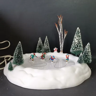 LOT 176: Department 56 Village Animated Skating Pond and North Pole Series Elves on Ice