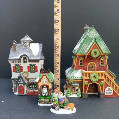 LOT 134: Department 56 North Pole Series Santa's Rooming House, Neenee's Dolls & Toys, and End of the Line