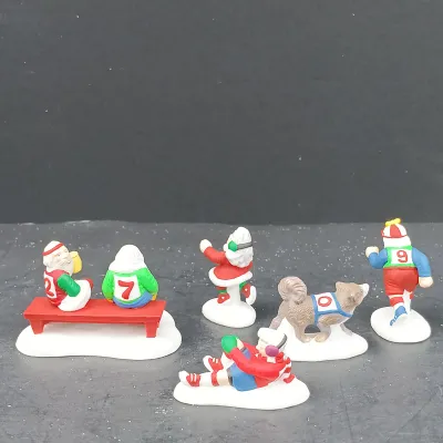 LOT 166: Department 56 North Pole Series Ginny's Cookie Treats Set, Christmas Fun Run and Have a Seat Elves