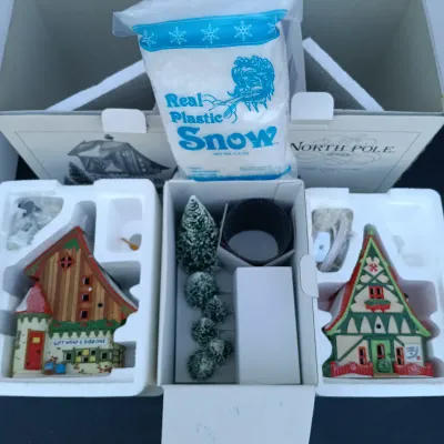 LOT 125: Department 56 North Pole Series Start a Tradition Set with Pencil Pines