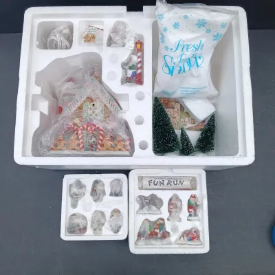 LOT 166: Department 56 North Pole Series Ginny's Cookie Treats Set, Christmas Fun Run and Have a Seat Elves