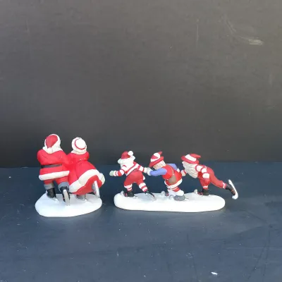 LOT 131: Department 56 Peppermint Skating Party, Untangle the Christmas Lights, A Busy Elf and Elf Bunkhouse