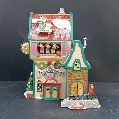 LOT 164: Department 56 North Pole Series Marie's Doll Museum and Jack In The Box Plant No. 2