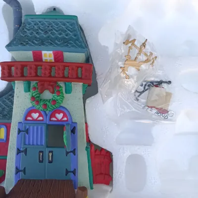 LOT 131: Department 56 Peppermint Skating Party, Untangle the Christmas Lights, A Busy Elf and Elf Bunkhouse
